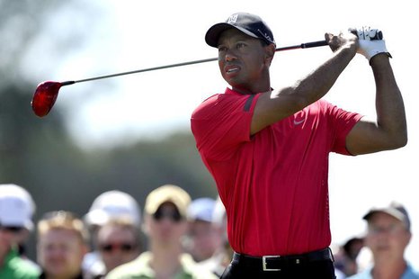 Mar 2, 2014; Palm Beach Gardens, FL, USA; Tiger Woods drives on nine during the final round of The Honda Classic golf tournament at PGA Nati Mar 2, 2014; Palm Beach Gardens, FL, USA; Tiger Woods drives on nine during the final round of The Honda Classic golf tournament at PGA Nati