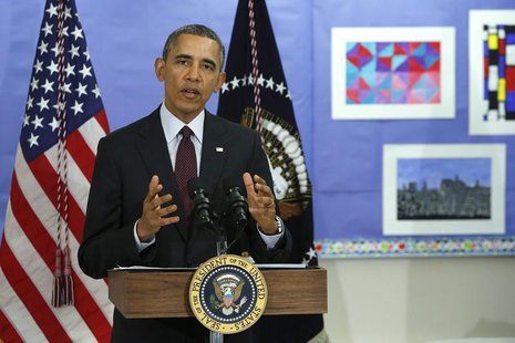 U.S. President Barack Obama answers a question about the situation in Ukraine, following remarks on the budget at Powell Elementary School i U.S. President Barack Obama answers a question about the situation in Ukraine, following remarks on the budget at Powell Elementary School i