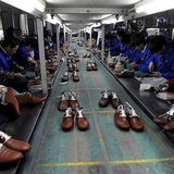 Employees work at a shoe factory in Lishui, Zhejiang province, January 24, 2013. REUTERS/Lang Lang Employees work at a shoe factory in Lishui, Zhejiang province, January 24, 2013. REUTERS/Lang Lang