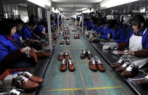 Employees work at a shoe factory in Lishui, Zhejiang province, January 24, 2013. REUTERS/Lang Lang Employees work at a shoe factory in Lishui, Zhejiang province, January 24, 2013. REUTERS/Lang Lang