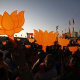 Supporters of Gujarat's chief minister and Hindu nationalist Narendra Modi, the prime ministerial candidate for India's main opposition Bhar Supporters of Gujarat's chief minister and Hindu nationalist Narendra Modi, the prime ministerial candidate for India's main opposition Bhar