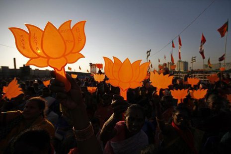 Supporters of Gujarat's chief minister and Hindu nationalist Narendra Modi, the prime ministerial candidate for India's main opposition Bhar Supporters of Gujarat's chief minister and Hindu nationalist Narendra Modi, the prime ministerial candidate for India's main opposition Bhar