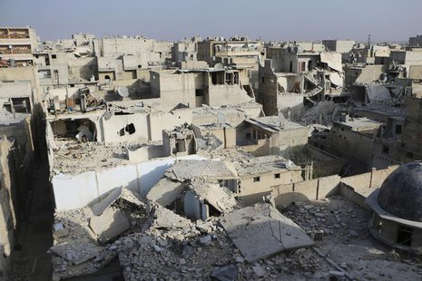 A general view of damage after what activists said was an air strike by forces loyal to Syria's President Bashar al-Assad in the Al-Maysar n A general view of damage after what activists said was an air strike by forces loyal to Syria's President Bashar al-Assad in the Al-Maysar n