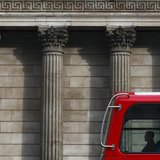 A man travels in a double-decker bus as it passes the Bank of England in central London March 24, 2010. REUTERS/Darrin Zammit Lupi A man travels in a double-decker bus as it passes the Bank of England in central London March 24, 2010. REUTERS/Darrin Zammit Lupi