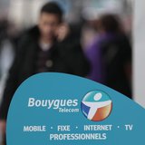 A man makes a phone call near a Bouygues Telecom company shop in Nice March 5, 2014. REUTERS/Eric Gaillard A man makes a phone call near a Bouygues Telecom company shop in Nice March 5, 2014. REUTERS/Eric Gaillard