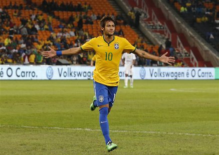 Brazil's Neymar celebrates his goal against South Africa during their international friendly soccer match at the First National Bank (FNB) S Brazil's Neymar celebrates his goal against South Africa during their international friendly soccer match at the First National Bank (FNB) S