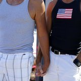 A gay couple holds hands during a rally in support of the United States Supreme Court decision on marriage rights in San Diego, California J A gay couple holds hands during a rally in support of the United States Supreme Court decision on marriage rights in San Diego, California J