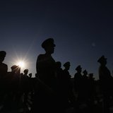 Military delegates are silhouetted as they arrive at Tiananmen Square outside the Great Hall of the People for the opening session of Nation Military delegates are silhouetted as they arrive at Tiananmen Square outside the Great Hall of the People for the opening session of Nation