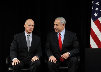 Israel's Prime Minister Benjamin Netenyahu (R) and California Governor Jerry Brown talk prior to their speeches at the Computer History Muse Israel's Prime Minister Benjamin Netenyahu (R) and California Governor Jerry Brown talk prior to their speeches at the Computer History Muse