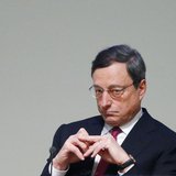 European Central Bank (ECB) President Mario Draghi waits to deliver a speech at a conference for the 20th anniversary of the establishment o European Central Bank (ECB) President Mario Draghi waits to deliver a speech at a conference for the 20th anniversary of the establishment o