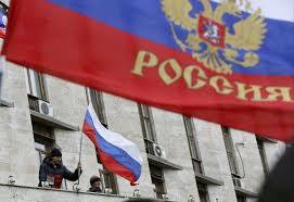 Ukraine on raised its flag over the government headquarters in the eastern city of Donetsk where a Russian flag had stood since Saturday. Reuters/Valeriy Bilokryl Ukraine on raised its flag over the government headquarters in the eastern city of Donetsk where a Russian flag had stood since Saturday. Reuters/Valeriy Bilokryl