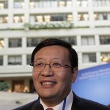 Chinese Minister of Finance Lou Jiwei smiles before the G20 finance ministers and central bank governors family photo during 2013 Spring Mee Chinese Minister of Finance Lou Jiwei smiles before the G20 finance ministers and central bank governors family photo during 2013 Spring Mee