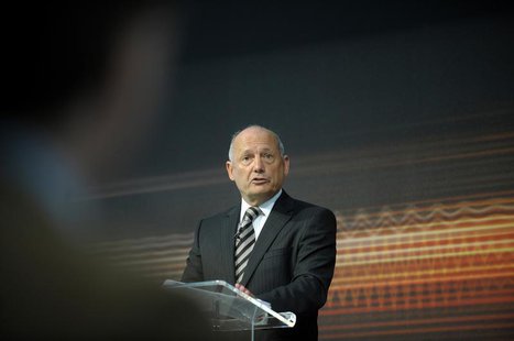 McLaren Automotive Executive Chairman Ron Dennis addresses the media at the official unveiling of the new MP4-12C road car at the McLaren Te McLaren Automotive Executive Chairman Ron Dennis addresses the media at the official unveiling of the new MP4-12C road car at the McLaren Te