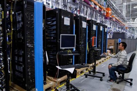 Hewlett-Packard ProLiant commercial data servers destined for cloud computing are assembled by workers at a company manufacturing facility i Hewlett-Packard ProLiant commercial data servers destined for cloud computing are assembled by workers at a company manufacturing facility i