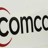 A Comcast sign is shown in San Francisco, California February 13, 2014. REUTERS/Robert Galbraith A Comcast sign is shown in San Francisco, California February 13, 2014. REUTERS/Robert Galbraith