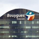 A Bouygues Telecom company logo is seen on the facade of the Sequana tower, the company's headquarters, in Issy-Les-Moulineaux, near Paris, A Bouygues Telecom company logo is seen on the facade of the Sequana tower, the company's headquarters, in Issy-Les-Moulineaux, near Paris,