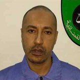 Saadi Gaddafi, son of Muammar Gaddafi, looks on inside a prison in Tripoli in this handout photograph provided by the prison's relations dep Saadi Gaddafi, son of Muammar Gaddafi, looks on inside a prison in Tripoli in this handout photograph provided by the prison's relations dep