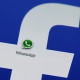 A Whatsapp icon is seen on a Samsung Galaxy S4 phone screen with a Facebook logo in the central Bosnian town of Zenica, February 20, 2014. R A Whatsapp icon is seen on a Samsung Galaxy S4 phone screen with a Facebook logo in the central Bosnian town of Zenica, February 20, 2014. R