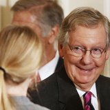 U.S.Sen. Mitch McConnell (R-KY) walks out after President Barack Obama announced the first five "Promise Zones" as promised in last year's S U.S.Sen. Mitch McConnell (R-KY) walks out after President Barack Obama announced the first five "Promise Zones" as promised in last year's S