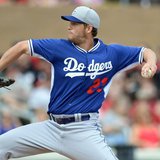 Feb 26, 2014; Salt River Pima-Maricopa, AZ, USA; Los Angeles Dodgers starting pitcher Clayton Kershaw (22) throws a pitch against the Arizon Feb 26, 2014; Salt River Pima-Maricopa, AZ, USA; Los Angeles Dodgers starting pitcher Clayton Kershaw (22) throws a pitch against the Arizon