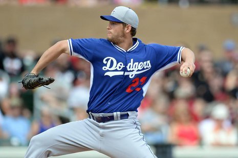 Feb 26, 2014; Salt River Pima-Maricopa, AZ, USA; Los Angeles Dodgers starting pitcher Clayton Kershaw (22) throws a pitch against the Arizon Feb 26, 2014; Salt River Pima-Maricopa, AZ, USA; Los Angeles Dodgers starting pitcher Clayton Kershaw (22) throws a pitch against the Arizon