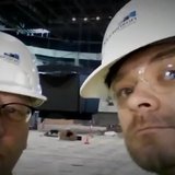 Craig Mattick and Chris Tubbs watch the scoreboard go up at the Events Center. Craig Mattick and Chris Tubbs watch the scoreboard go up at the Events Center.