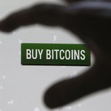 Tembusu Terminals' Andras Kristof gestures as he speaks to the media after launching the first Bitcoin vending machine at a pub in Singapore Tembusu Terminals' Andras Kristof gestures as he speaks to the media after launching the first Bitcoin vending machine at a pub in Singapore