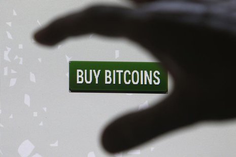 Tembusu Terminals' Andras Kristof gestures as he speaks to the media after launching the first Bitcoin vending machine at a pub in Singapore Tembusu Terminals' Andras Kristof gestures as he speaks to the media after launching the first Bitcoin vending machine at a pub in Singapore