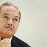 Mexican telecommunications and retail tycoon Carlos Slim Helu waits before delivering his speech on the impact of new technologies during a Mexican telecommunications and retail tycoon Carlos Slim Helu waits before delivering his speech on the impact of new technologies during a