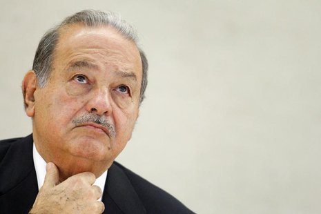 Mexican telecommunications and retail tycoon Carlos Slim Helu waits before delivering his speech on the impact of new technologies during a Mexican telecommunications and retail tycoon Carlos Slim Helu waits before delivering his speech on the impact of new technologies during a