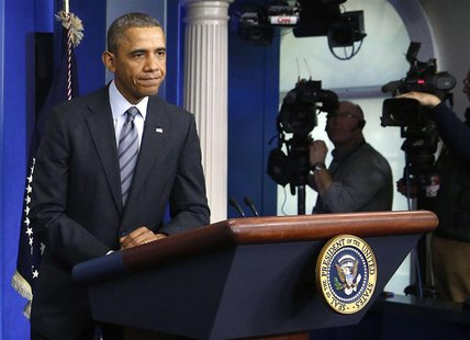 U.S. President Barack Obama finishes delivering a statement on the situation in Ukraine, in the press briefing room at the White House in Wa U.S. President Barack Obama finishes delivering a statement on the situation in Ukraine, in the press briefing room at the White House in Wa