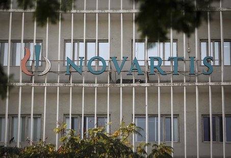 A Novartis logo is pictured on its headquarters building in Mumbai February 6, 2014. REUTERS/Danish Siddiqui A Novartis logo is pictured on its headquarters building in Mumbai February 6, 2014. REUTERS/Danish Siddiqui