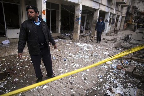 A policeman cordons off the site of a bomb attack at the district court in Islamabad March 3, 2014. REUTERS/Zohra Bensemra A policeman cordons off the site of a bomb attack at the district court in Islamabad March 3, 2014. REUTERS/Zohra Bensemra