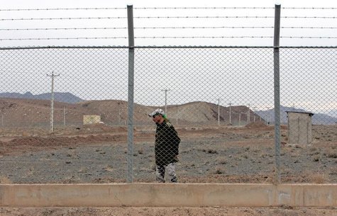 An Iranian soldier stands guard inside the Natanz uranium enrichment facility, 322km (200 miles) south of Iran's capital Tehran March 9, 200 An Iranian soldier stands guard inside the Natanz uranium enrichment facility, 322km (200 miles) south of Iran's capital Tehran March 9, 200