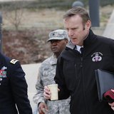 Brigadier General Jeffrey Sinclair (R), along with one of his attorneys, Maj. Sean Foster (L), leave the courthouse for the day at Ft. Bragg Brigadier General Jeffrey Sinclair (R), along with one of his attorneys, Maj. Sean Foster (L), leave the courthouse for the day at Ft. Bragg