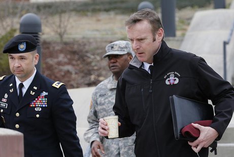 Brigadier General Jeffrey Sinclair (R), along with one of his attorneys, Maj. Sean Foster (L), leave the courthouse for the day at Ft. Bragg Brigadier General Jeffrey Sinclair (R), along with one of his attorneys, Maj. Sean Foster (L), leave the courthouse for the day at Ft. Bragg