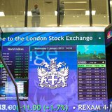 Workers speak above an electronic information board at the London Stock Exchange in the City of London January 2, 2013. REUTERS/Paul Hackett Workers speak above an electronic information board at the London Stock Exchange in the City of London January 2, 2013. REUTERS/Paul Hackett
