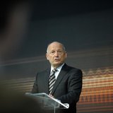 McLaren Automotive Executive Chairman Ron Dennis addresses the media at the official unveiling of the new MP4-12C road car at the McLaren Te McLaren Automotive Executive Chairman Ron Dennis addresses the media at the official unveiling of the new MP4-12C road car at the McLaren Te