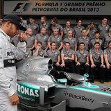 Mercedes Formula One drivers Lewis Hamilton of Britain arrive to pose with team members at the Interlagos circuit in Sao Paulo November 24, Mercedes Formula One drivers Lewis Hamilton of Britain arrive to pose with team members at the Interlagos circuit in Sao Paulo November 24,