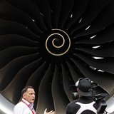 Journalists work next to the Rolls Royce engine of an Airbus A350 on display at the Singapore Airshow February 11, 2014. REUTERS/Edgar Su Journalists work next to the Rolls Royce engine of an Airbus A350 on display at the Singapore Airshow February 11, 2014. REUTERS/Edgar Su