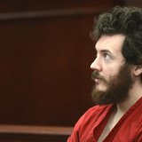 Accused Aurora theater shooting suspect James Holmes listens at his arraignment in Centennial, Colorado March 12, 2013. REUTERS/R.J. Sangost Accused Aurora theater shooting suspect James Holmes listens at his arraignment in Centennial, Colorado March 12, 2013. REUTERS/R.J. Sangost