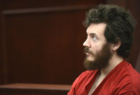 Accused Aurora theater shooting suspect James Holmes listens at his arraignment in Centennial, Colorado March 12, 2013. REUTERS/R.J. Sangost Accused Aurora theater shooting suspect James Holmes listens at his arraignment in Centennial, Colorado March 12, 2013. REUTERS/R.J. Sangost