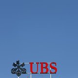 The logo of Swiss bank UBS is seen on an office building in Zurich July 22, 2013. REUTERS/Arnd Wiegmann The logo of Swiss bank UBS is seen on an office building in Zurich July 22, 2013. REUTERS/Arnd Wiegmann