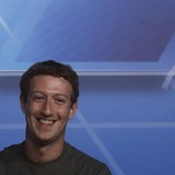 Facebook Chief Executive Officer Mark Zuckerberg smiles in the stage before delivering a keynote speech during the Mobile World Congress in Facebook Chief Executive Officer Mark Zuckerberg smiles in the stage before delivering a keynote speech during the Mobile World Congress in