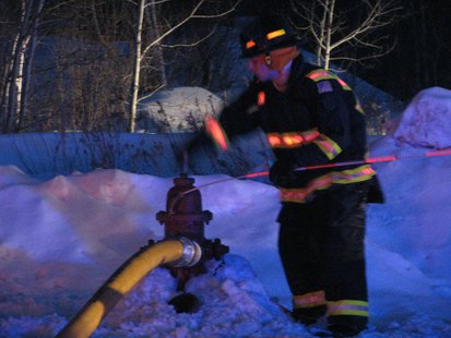 Fireman closing hydrant
Fireman closing hydrant