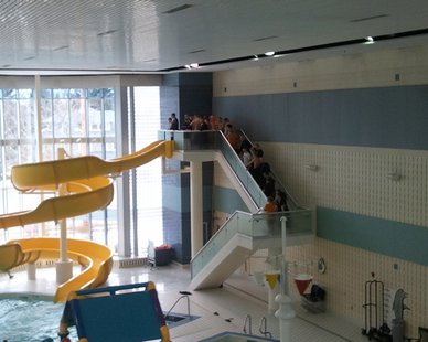 What championship high school swimming team will be taking the traditional victory slide at the Holland Community Aquatic Center this Saturday? What championship high school swimming team will be taking the traditional victory slide at the Holland Community Aquatic Center this Saturday?