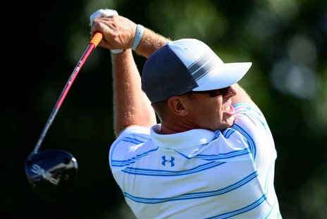 Mar 7, 2014; Miami, FL, USA; Hunter Mahan tees off from the 17th tee during the first round of the WGC - Cadillac Championship golf tourname Mar 7, 2014; Miami, FL, USA; Hunter Mahan tees off from the 17th tee during the first round of the WGC - Cadillac Championship golf tourname