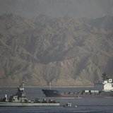 An Israeli Navy boat escorts the Panamanian-flagged cargo vessel Klos C into the Israeli port of Eilat on Saturday after seizing it in the R An Israeli Navy boat escorts the Panamanian-flagged cargo vessel Klos C into the Israeli port of Eilat on Saturday after seizing it in the R