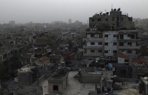 A general view of damaged buildings are seen in the besieged area of Homs March 3, 2014. REUTERS/Yazan Homsy A general view of damaged buildings are seen in the besieged area of Homs March 3, 2014. REUTERS/Yazan Homsy