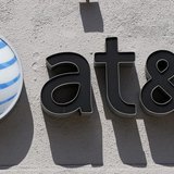 An At&T logo is seen atop a store in Beverly Hills, California August 31, 2011. REUTERS/Danny Moloshok An At&T logo is seen atop a store in Beverly Hills, California August 31, 2011. REUTERS/Danny Moloshok